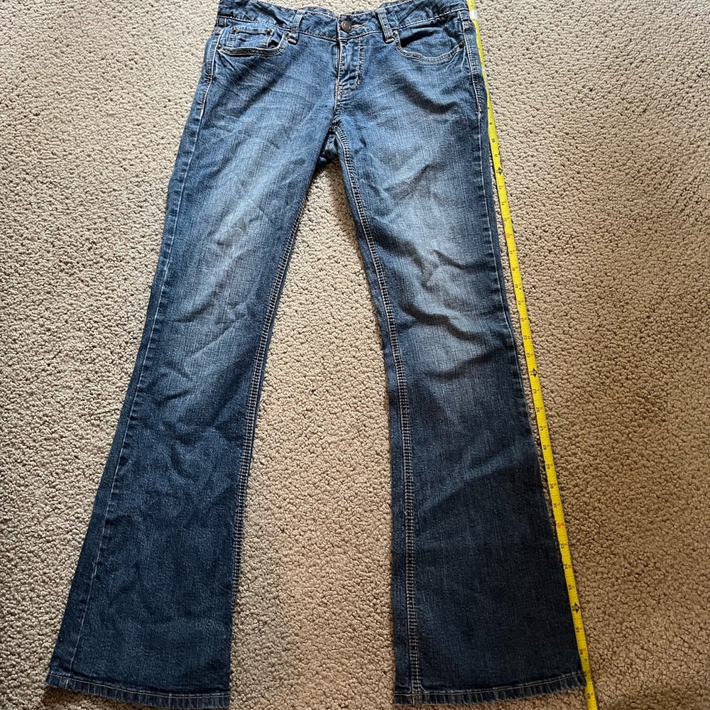 Rue21 low rise flared leg jeans.